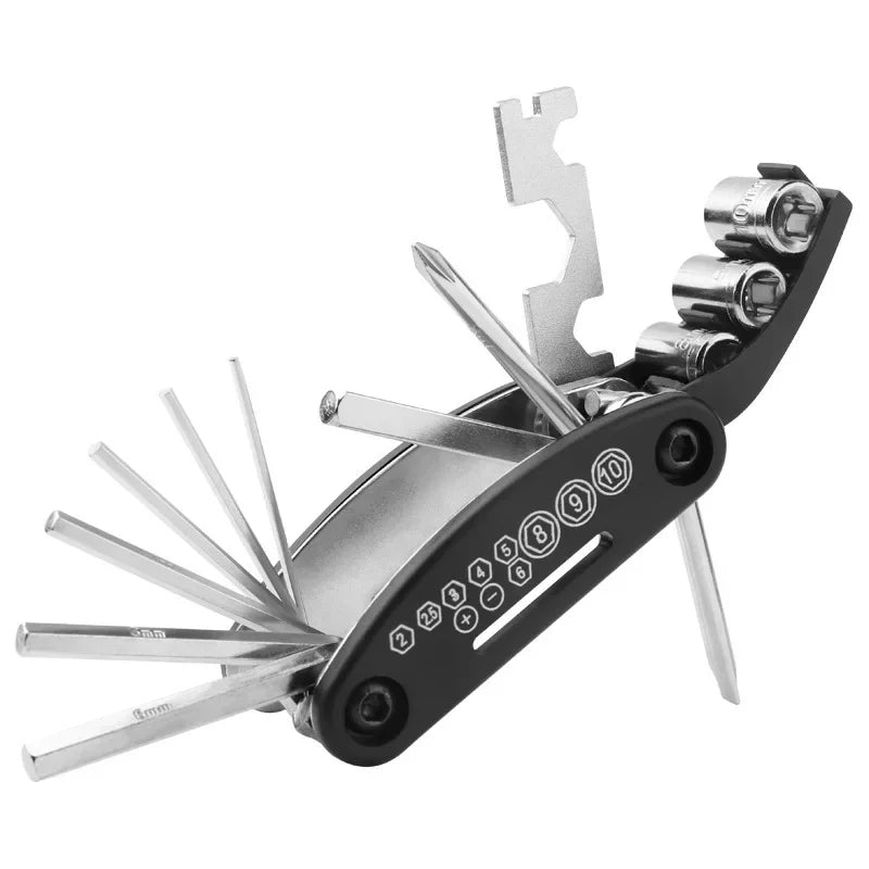 Multitool with various tools on a white background. 8 9 10 mm socket bike tool, 14G spoke wrench multitool, hex 2 2.5 3 4 5 6 mm tool, budget bike multitool.