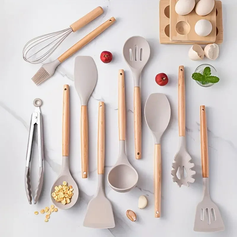 Set of kitchen utensils with wooden handles on a light background. silicone wooden handle kitchen utensil set Pakistan.