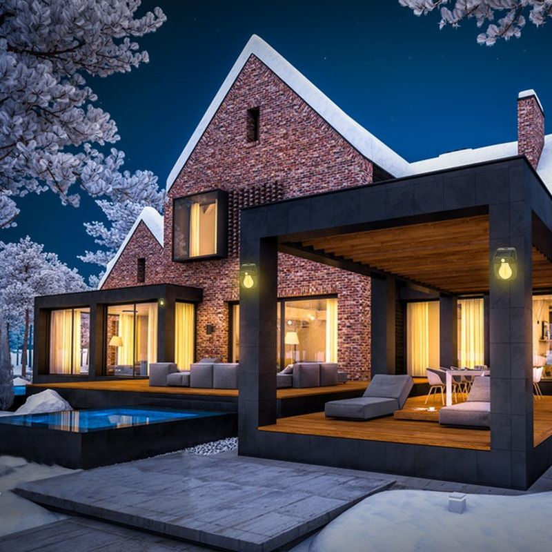 Modern house with a snowy landscape at night. solar wall light CL-228, solar motion sensor light Pakistan, outdoor waterproof solar light.