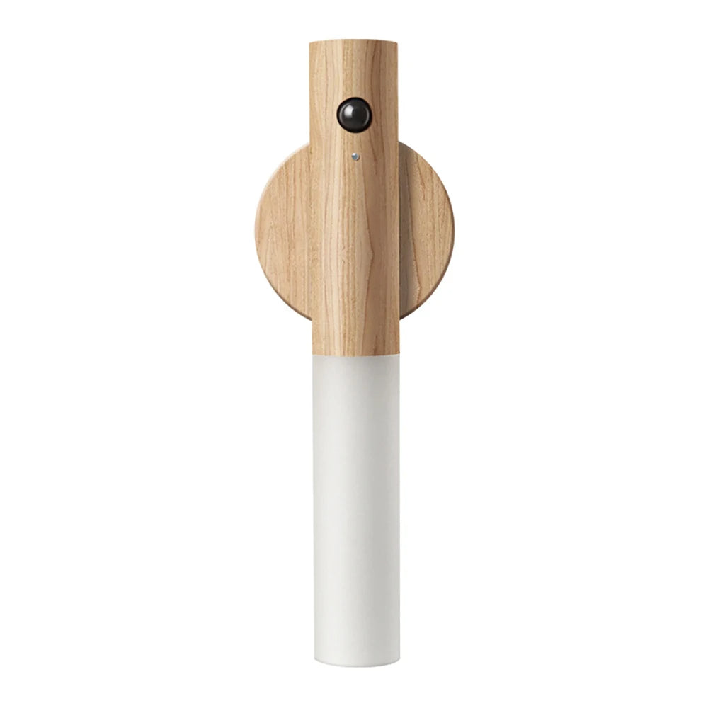 Wooden pepper grinder with white base on a white background.  magnetic motion sensor night light, wooden rechargeable night lamp.