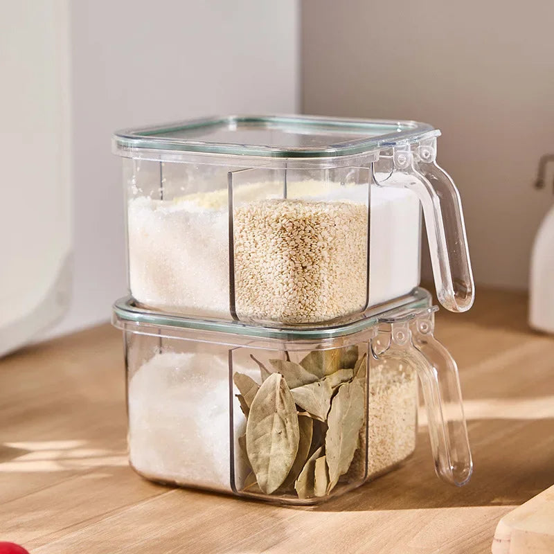 Clear glass storage containers with handles on a wooden surface. four grid masala container with spoons, airtight spice organizer price in Pakistan, stackable seasoning box for small kitchens