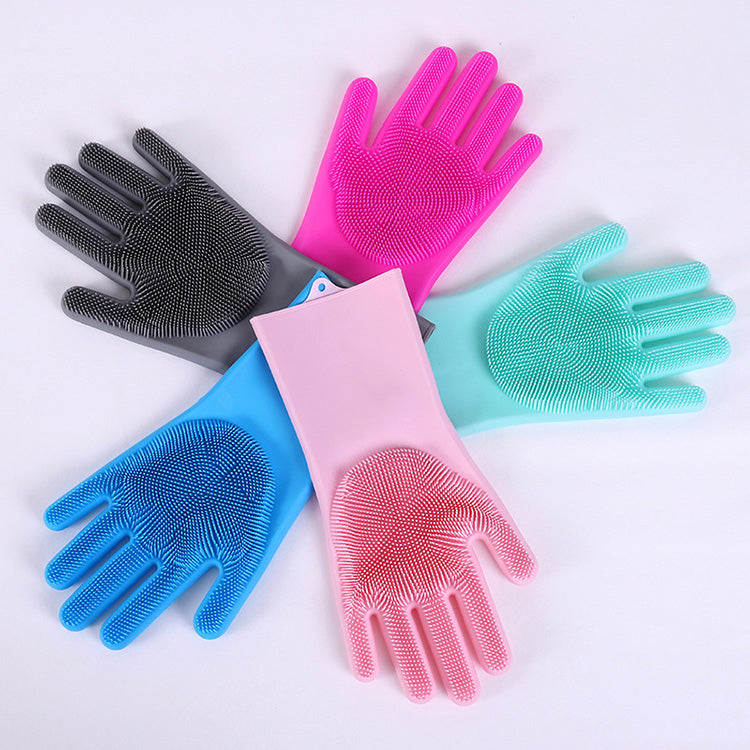 Set of five silicone gloves in different colors on a white background, magic silicone scrubber gloves, heat resistant dishwashing gloves