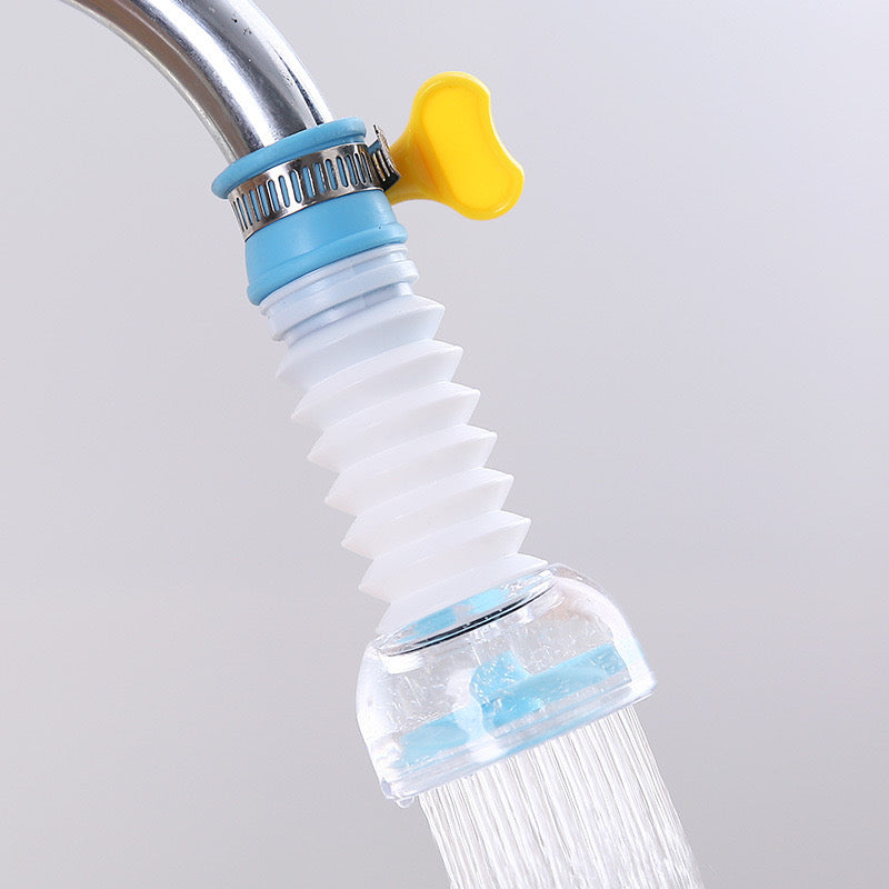 Flexible shower head with blue and yellow components on a gray background. rotating faucet filter, water saving tap nozzle, kitchen sink aerator pk, 360 splash sprayer, faucet booster Pakistan