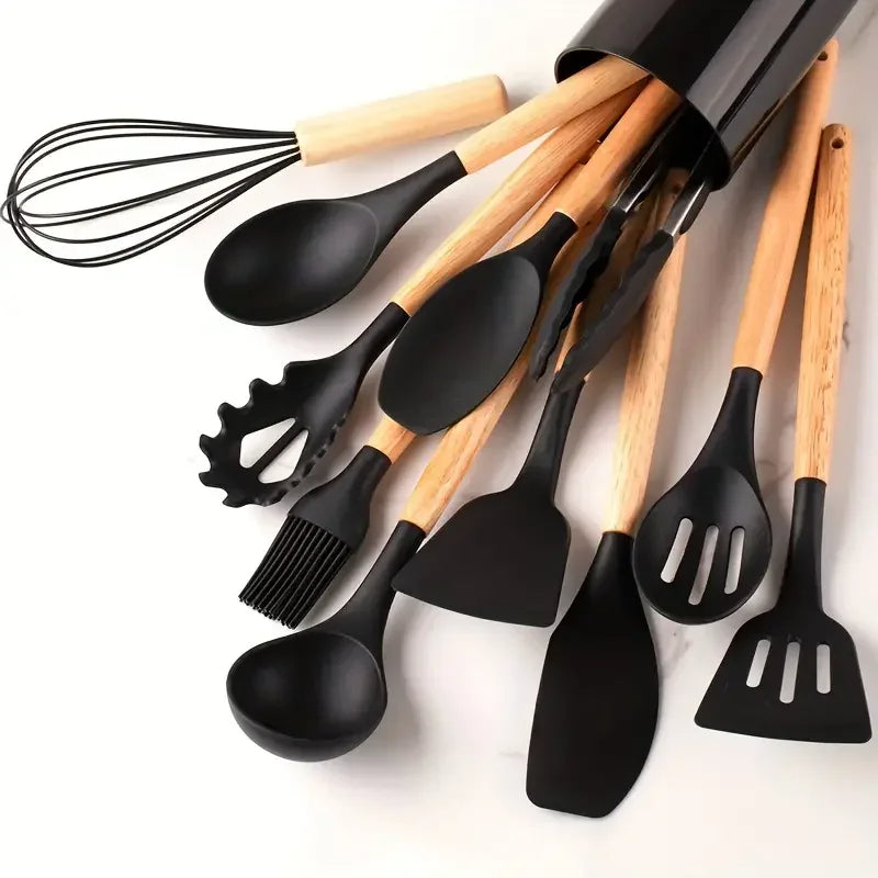 Set of black silicone kitchen utensils with wooden handles on a white background. silicone wooden handle kitchen utensil set Pakistan..