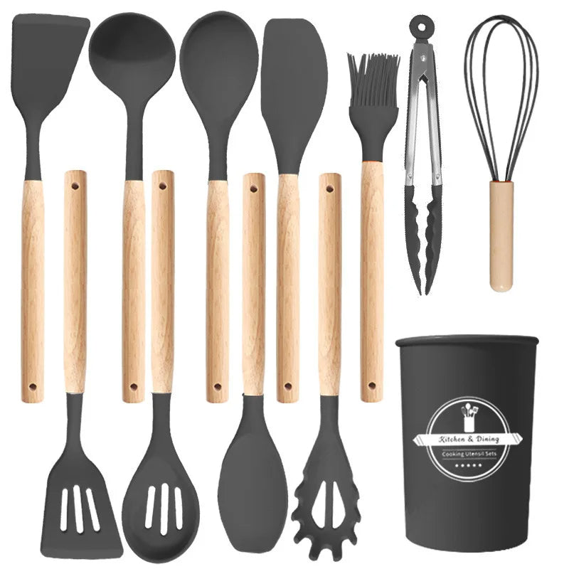 Set of kitchen utensils with wooden handles and a black container on a white background. silicone wooden handle kitchen utensil set Pakistan..
