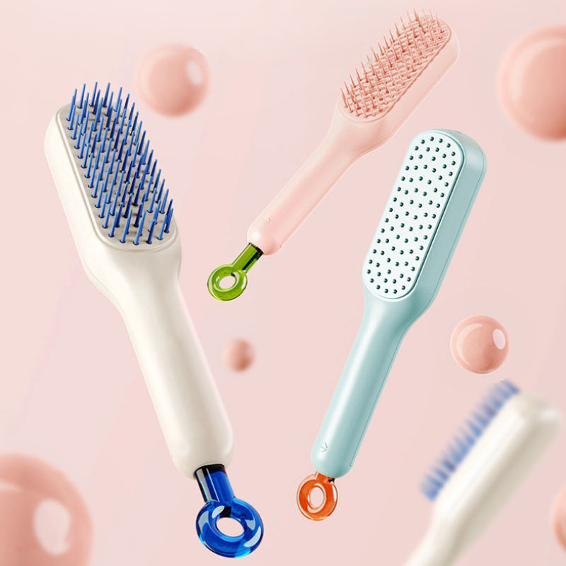 Set of three self cleaning hair brush with different designs on a pink background